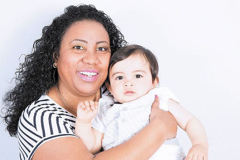 Smiling photo of mum and baby