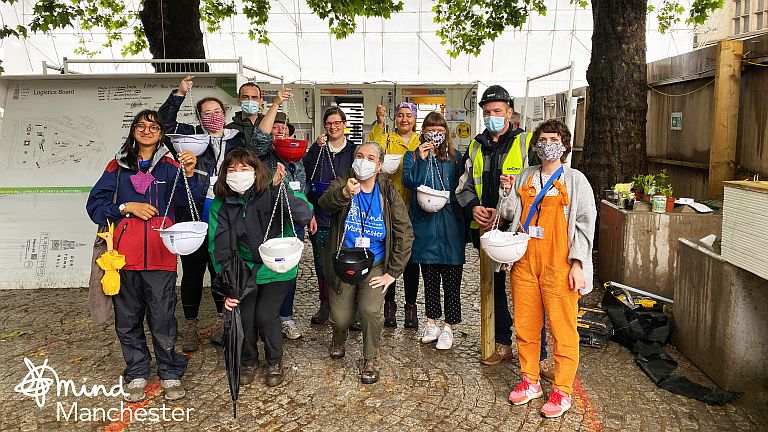 Smiling photo of the allotment team