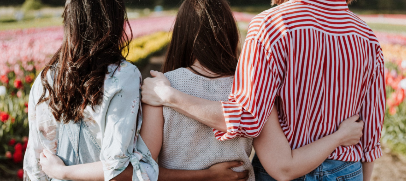 Friends embracing each other