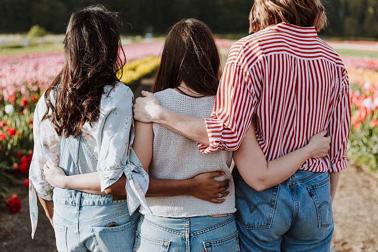 Friends embracing each other