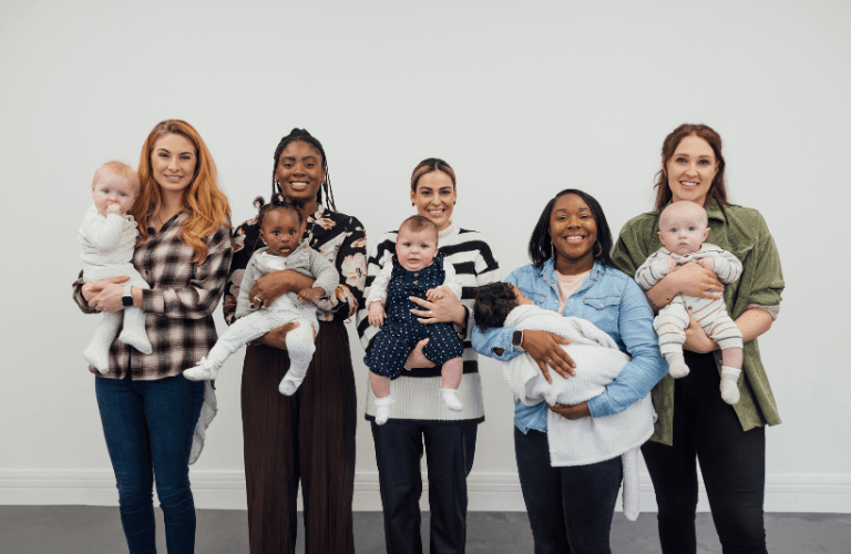 Group of mums holding their babies